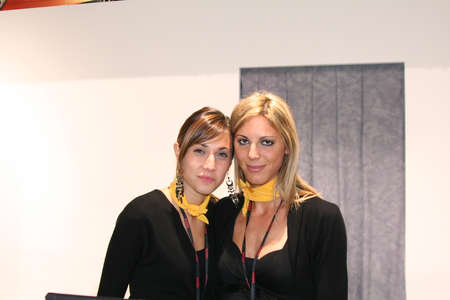 Milan, Italy - 2021 11 27: Eicma Milano Bike Expo blonde sexy girl. High quality photoのeditorial素材