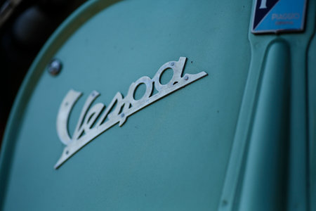 Bibbiano-Reggio Emilia Italy - 07 15 2015: Free rally of vintage cars in the town square Piaggio...