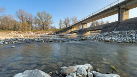 pedestrian bridge over the river Enza in Montecchio Emilia at sunset. High quality photoの写真素材