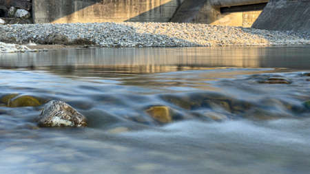 detail of water with cascades in long exposure at sunset. High quality photoの写真素材
