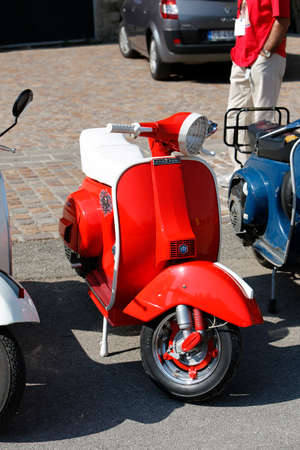 Bibbiano-Reggio Emilia Italy - 07 15 2015: Free rally of vintage cars in the town square Piaggio Versap Px150e. High quality photoのeditorial素材