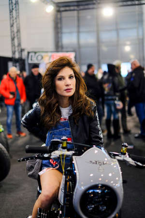 Verona, Italy - 2019 01 12: MBE Verona Bike Expo Bike and Custom car exibituon - sexy brunette girl. High quality photoのeditorial素材