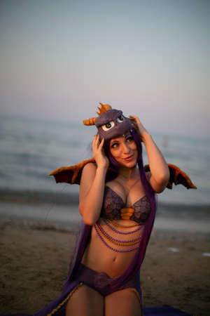 Rimini, Italy - 2016 07 21: Rimini Comics free cosplay event around beach and seaside Sphyro girl. High quality photoのeditorial素材