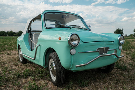 Reggio Emilia, Italy: 2021-08-10 Autobianchi Bianchina Spiaggina beautiful restored turquoise vintage car. High quality photoのeditorial素材