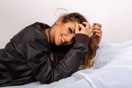 beautiful brunette italian girl posing in studio. High quality photoの写真素材