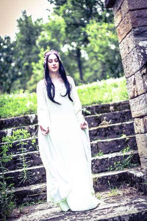 beautiful blue eyed Italian girl plays Arwen cosplay of the lord of the rings. High quality photo