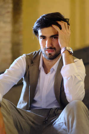 handsome Italian dark-haired guy with waistcoat. High quality photo
