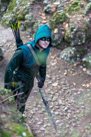 Lucca, Italy - 2018 10 31: Lucca Comics free cosplay event around city Arrow with his Bow. High quality photoのeditorial素材