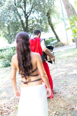 Rimini, Italy - 2016 07 21: Rimini Comics free cosplay event around beach and seaside Gorgo queen of Sparta with king Leonidas. High quality photoのeditorial素材