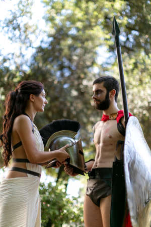Rimini, Italy - 2016 07 21: Rimini Comics free cosplay event around beach and seaside Gorgo queen of Sparta with king Leonidas. High quality photoのeditorial素材