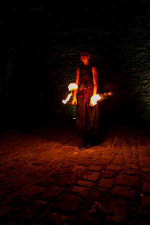 Montefiorino Modena, Italy: 2015 05 01 queen's day public event in the square with fire-eating juggler. High quality photoのeditorial素材