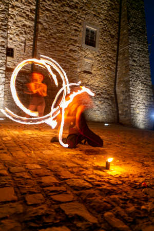 Montefiorino Modena, Italy: 2015 05 01 queen's day public event in the square with fire-eating...