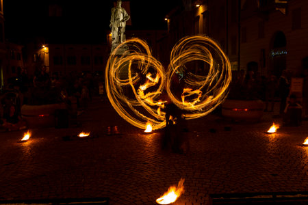 Reggio Emilia, Italy: 2013 09 14 public event in the square with fire-eating juggler High quality photoのeditorial素材