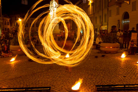 Reggio Emilia, Italy: 2013 09 14 public event in the square with fire-eating juggler High quality photoのeditorial素材