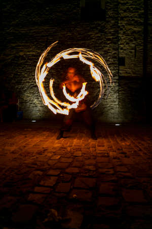 Montefiorino Modena, Italy: 2015 05 01 queen's day public event in the square with fire-eating...