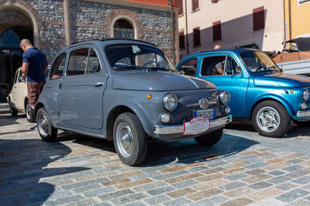 Bibbiano-Reggio Emilia Italy - 07 15 2015: Free rally of vintage cars in the town square gray Fiat 500. High quality photoのeditorial素材