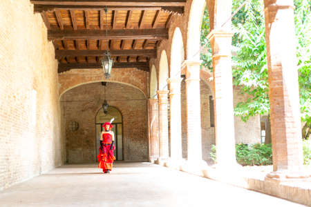 Lucca, Italy - 2018 10 31: Lucca Comics free cosplay event around city red dress girl. High quality photoのeditorial素材