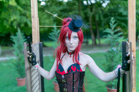 Lucca Comics free cosplay event around city steampunk girl with gun revolver. High quality photoの写真素材