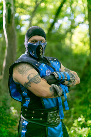Lucca Comics free cosplay event around city fighter with musk subzero. High quality photo