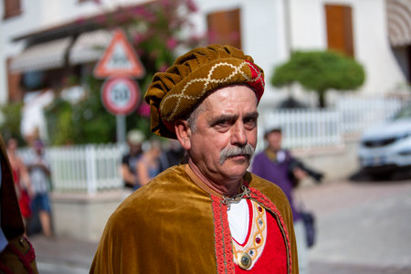 Canossa, Reggio Emilia - Italy: 2019 01 07 Medieval historical re-enactment of Martilde di Canossa with flag-wavers and extras in themed dresses. High quality photoのeditorial素材