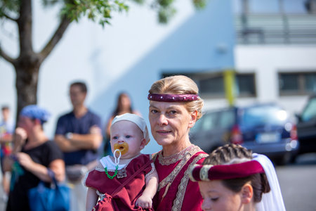 Canossa, Reggio Emilia - Italy: 2019 01 07 Medieval historical re-enactment of Martilde di Canossa with flag-wavers and extras in themed dresses. High quality photoのeditorial素材