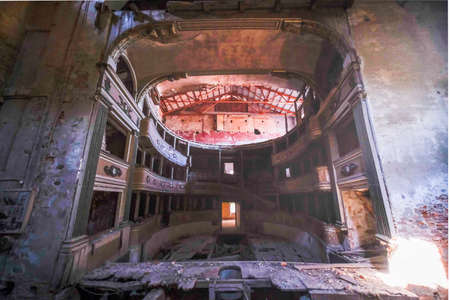 interior stage and armchairs of old decadent abandoned theater in Italy. High quality photoの写真素材