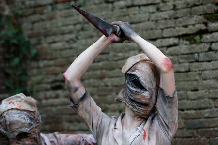Lucca, Italy - 2018 10 31: Lucca Comics free cosplay event around city Silent Hill Nurse. High quality photoのeditorial素材