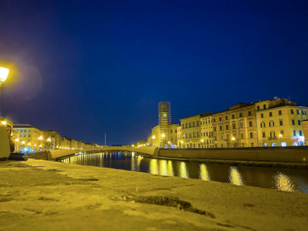 panorama of the Arno river in Pisa at night. High-quality photoの写真素材
