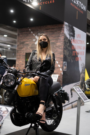 Verona, Italy - 2018 01 12: MBE Verona Bike Expo Bike and Custom car exibituon - Blonde Girl. High quality photoのeditorial素材