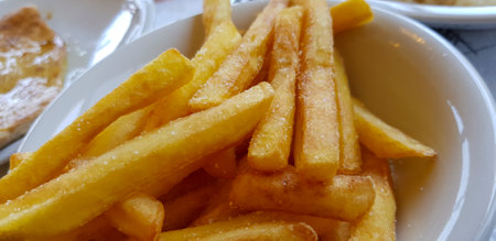 plate of french fries at the public canteen. High-quality photo