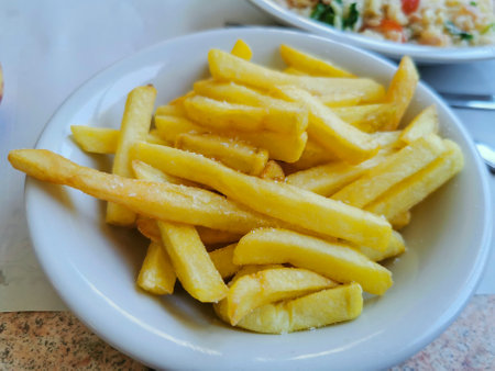 plate of french fries at the public canteen. High-quality photoの写真素材