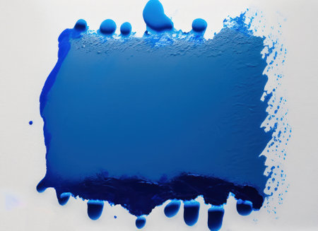 Close up of blue paint shapes on white background with copy space. High-quality photoの写真素材