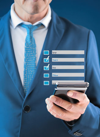 businessman with mobile phone and bar chart on the screen, blue backgroundの素材