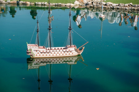 playing boat in water. High-quality photoの写真素材