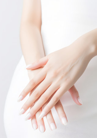 untanned delicate bridal manicured hands with pastel light white nail polish,generated with AI. High-quality photoの素材