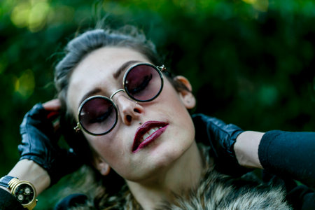 beautiful girl dressed dark steampunk portrait with sunglasses.High quality photo