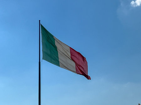 Italian flag waving in the wind on a sunny day. High-quality photoの写真素材