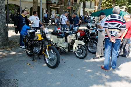 Bibbiano-Reggio Emilia Italy - 07 15 2015 : Free rally of vintage cars in the town square collection of old motobikes. High quality photoのeditorial素材