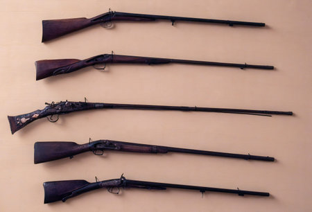 collection of vintage rifles displayed on the wall. High quality photo