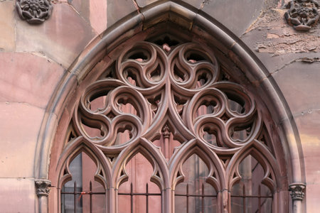 A close-up shot of the rose window on St. Paul's Church in Strasbourg, France.の写真素材