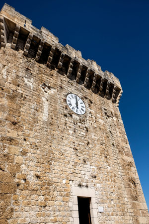 The impressive medieval Piccolomini Castle in Ortucchio, Italy, with its formidable stone walls,...
