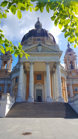 The Basilica of Superga, a stunning Baroque masterpiece, stands majestically on a hilltop overlooking the city of Turin, Italy. High quality photoの写真素材