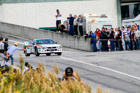 San Marino: 2010 09 01 Rally free event Iconic Lancia Rally 037 Cornering Past Crowd of Spectators...