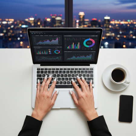 Professional Woman Analyzing Business Data on Laptop at Night.の素材