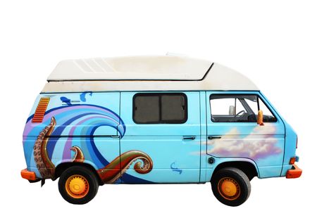 A retro blue van with ocean drawings on itの写真素材