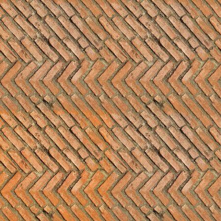 Seamless tile pattern of clay bricks. This is seamless pattern, meaning you can create an arbitrary image size by simply concatenating several of these images together. Each edge of this image matches with the oposite edge.の写真素材