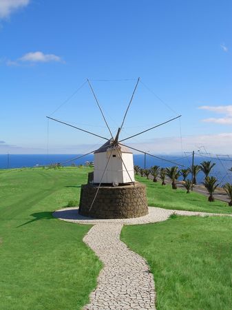 Windmill with the ecean in the backgroundの写真素材