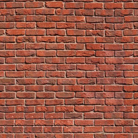 Seamless tile pattern of a clay brickwall. You can create an arbitrary image size by simply concatenating several of these images together. Each edge of this image matches with the opposite edge.の写真素材