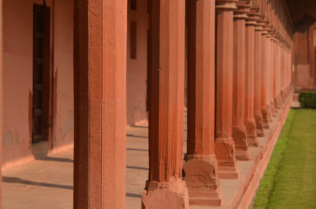 Perspective view of sandstone columns of Taj Mahal Mausoleum