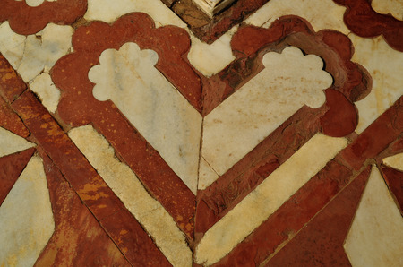 White Marble Wall of Taj Mahal, India with intricate designs and patterns with inlaid semi-precious stones のeditorial素材